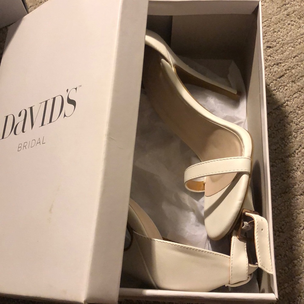 Cream Strappy high heels.